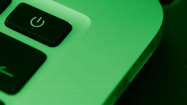 Illuminated computer power button, symbolizing the system boot process