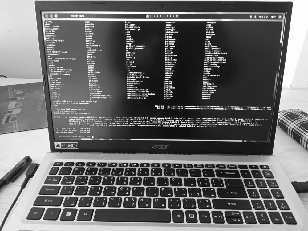 A full system update via pacman on a laptop running Arch Linux